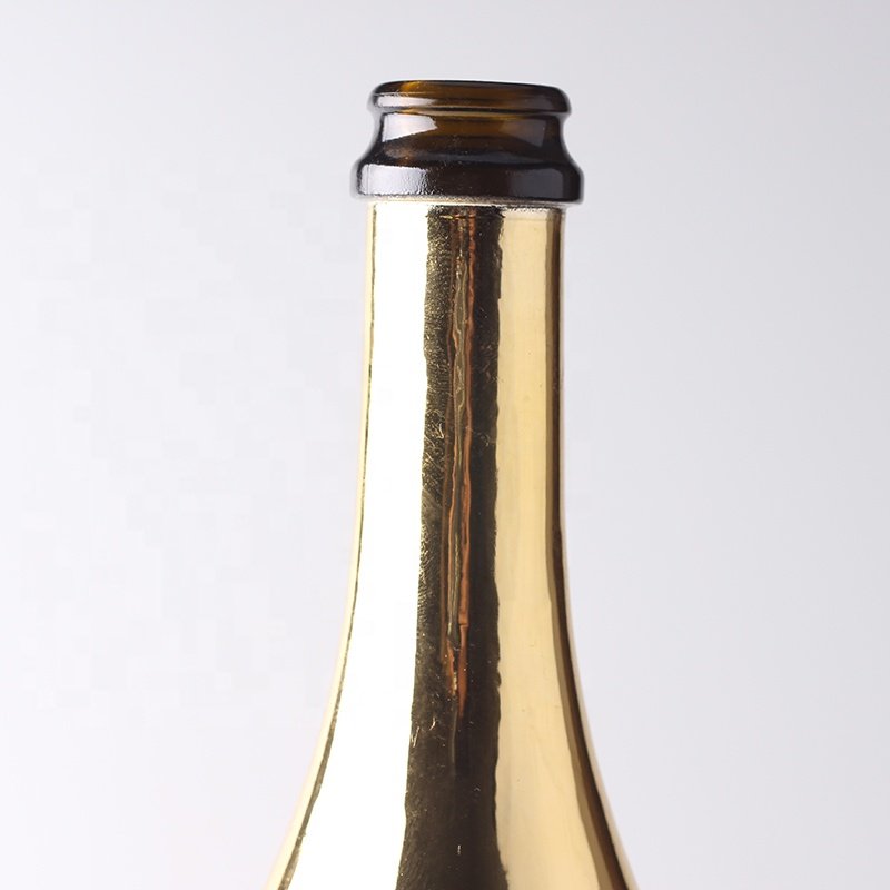 China Factory Custom Gold Champagne Glass Bottles With Plastic Cap
