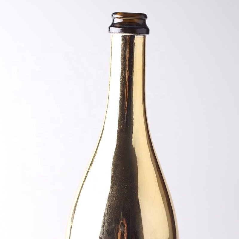 China Factory Custom Gold Champagne Glass Bottles With Plastic Cap