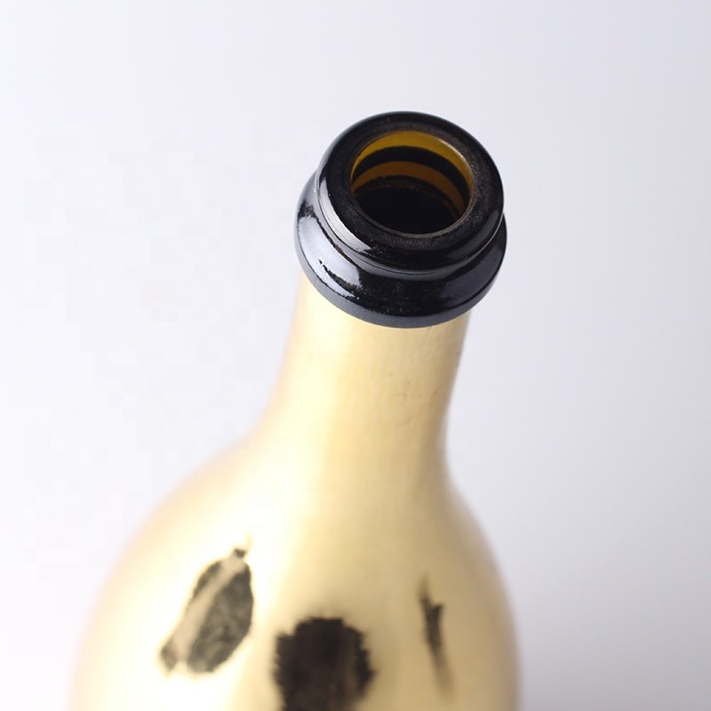 China Factory Custom Gold Champagne Glass Bottles With Plastic Cap