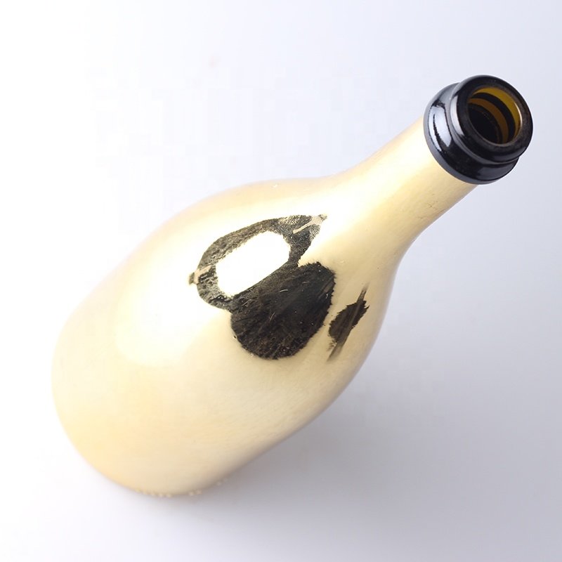 China Factory Custom Gold Champagne Glass Bottles With Plastic Cap