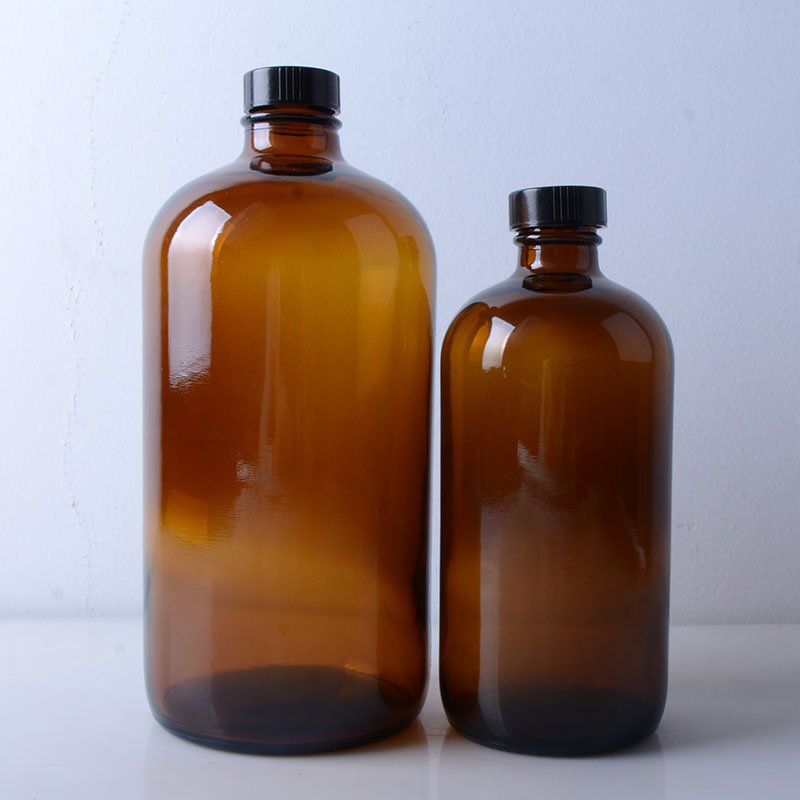 glass Boston round bottles with tamper evident cap