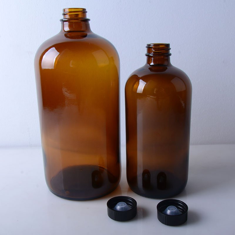 glass Boston round bottles with tamper evident cap