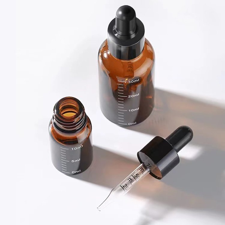 2024 Round Essential Oil Glass Bottle with Dropper Empty Custom Sizes Essential Oil Glass Bottle
