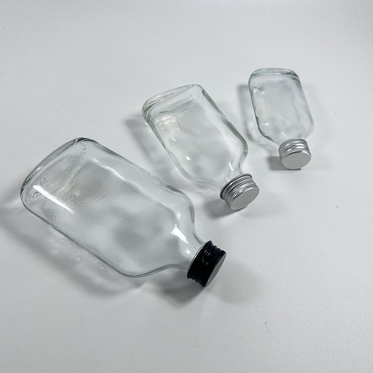 Empty 50Ml 100Ml Glass Bottle Mini Small Sample Thick Transparent Wine Glass Bottle with Screw Black Silver Cap