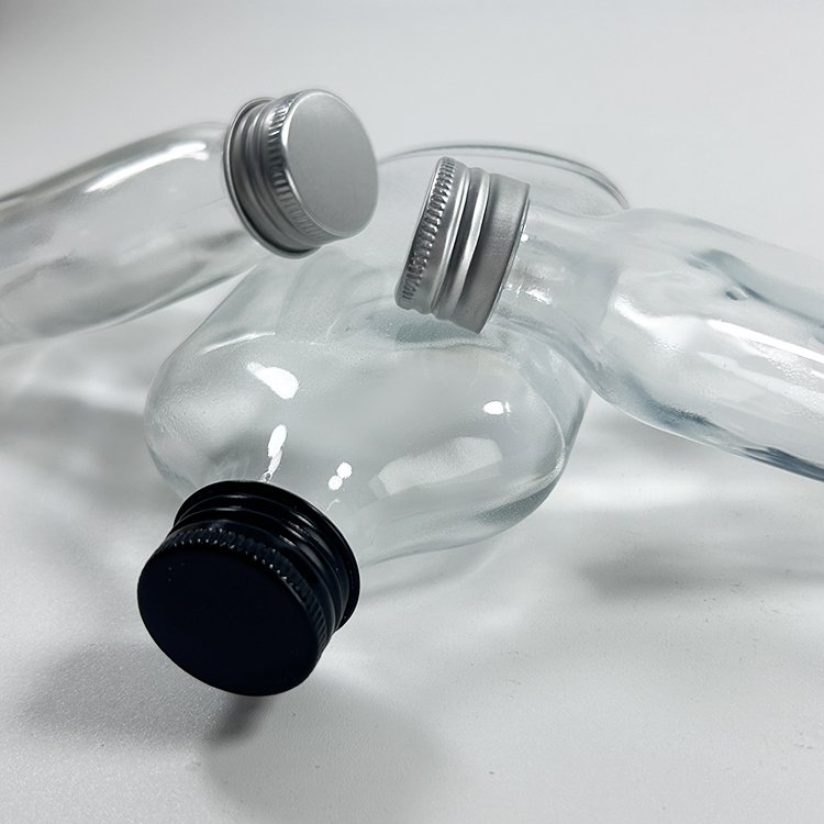 Empty 50Ml 100Ml Glass Bottle Mini Small Sample Thick Transparent Wine Glass Bottle with Screw Black Silver Cap