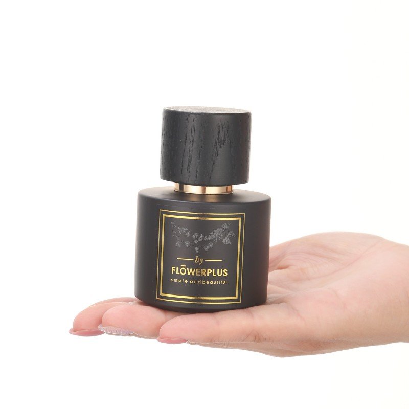 Wholesale 100ml 50ml 30ml Round Frosted Clear Glass Perfume Bottle With Wooden Cap