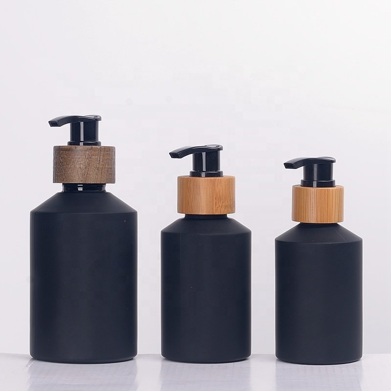 Inclined shoulder matte black glass bottle 30 ml 60 ml 100 ml cosmetic bottle and 15 gm 30 gm 50 gm glass jar with bamboo lid