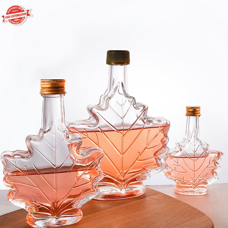 Luxury 50ml 100ml 250ml Maple leaf Glass Bottle for Wine Whisky Gin Beverage with aluminum lid