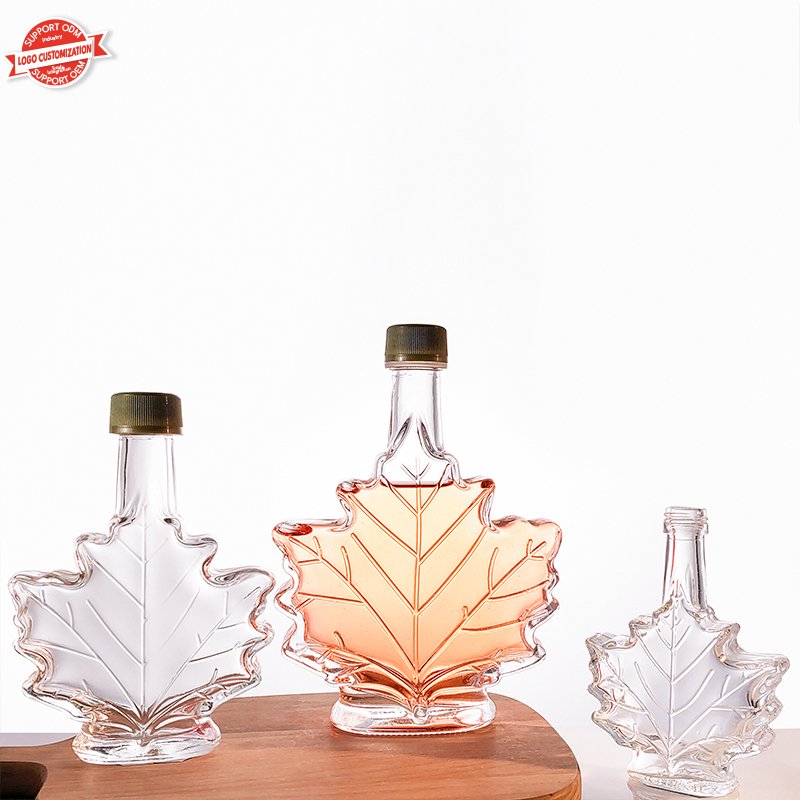 Luxury 50ml 100ml 250ml Maple leaf Glass Bottle for Wine Whisky Gin Beverage with aluminum lid