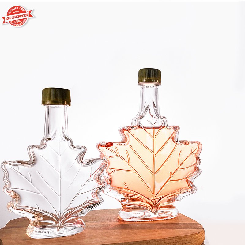 Luxury 50ml 100ml 250ml Maple leaf Glass Bottle for Wine Whisky Gin Beverage with aluminum lid