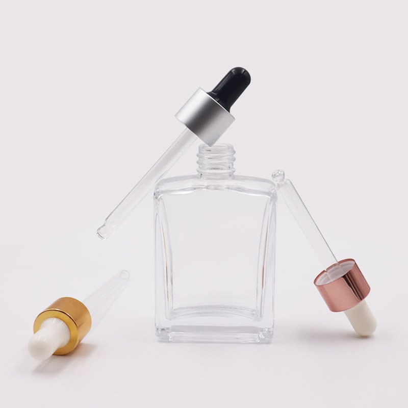 Custom 1 oz rectangular square clear amber essential oil serum bottles 30ml 50ml 100ml black glass dropper bottle with box