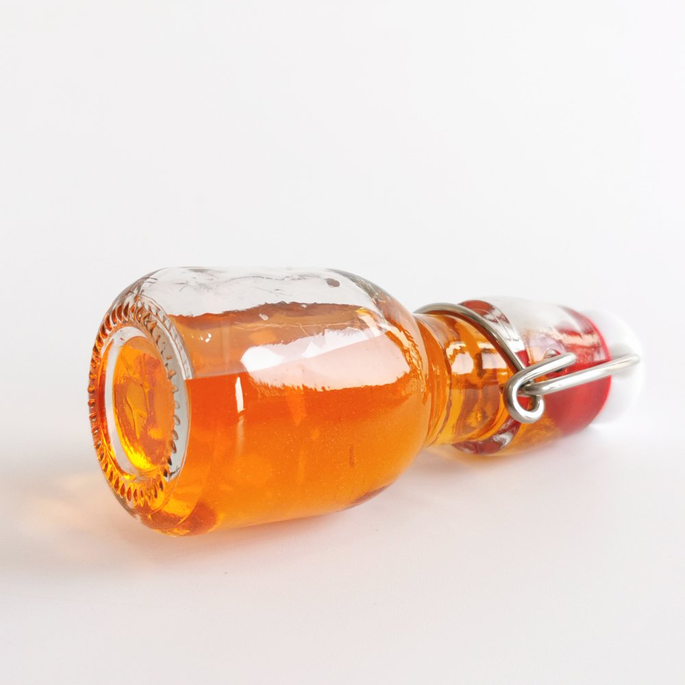 Stock 2oz 60ml 100ml Mini Clear Swing flip Top Glass Bottles Storage Bottles