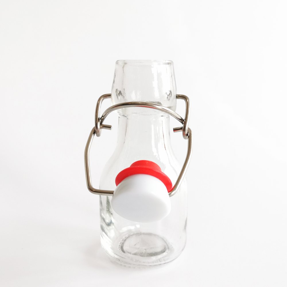 Stock 2oz 60ml 100ml Mini Clear Swing flip Top Glass Bottles Storage Bottles