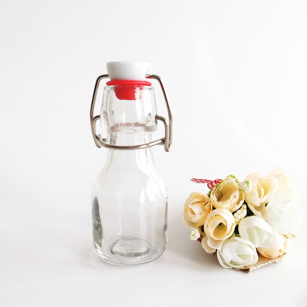 Stock 2oz 60ml 100ml Mini Clear Swing flip Top Glass Bottles Storage Bottles