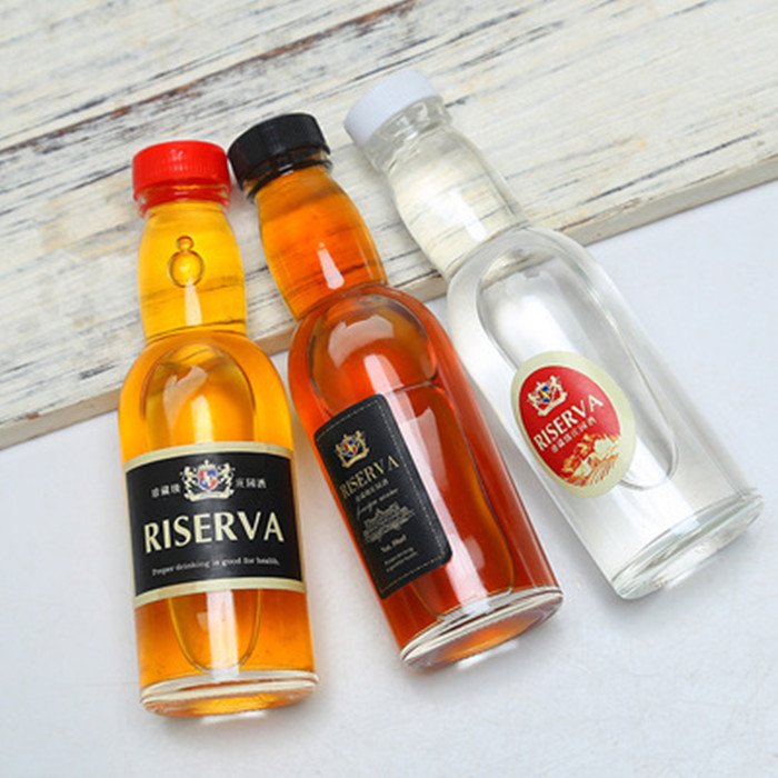 Wholesale 50ml Small Sample Alcohol Juice Drinks Glass Wine Bottle Liquor Glass Bottle With Screw Lid