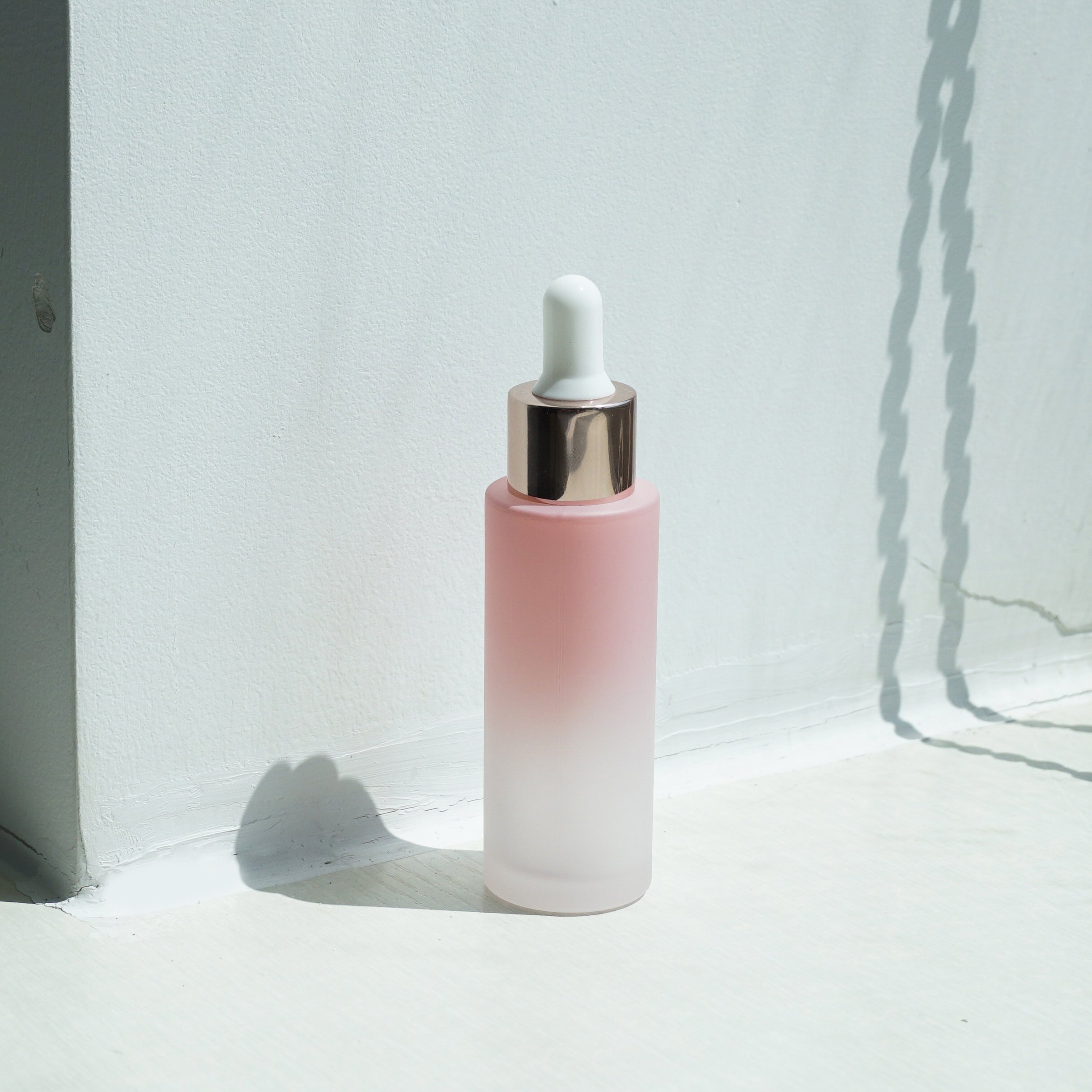 Luxury wholesale pink gradient frosted glass bottle set