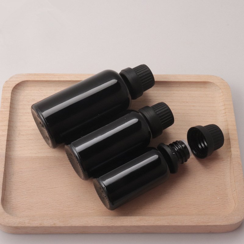 Good quality black oil bottle 5ml 30ml 100ml dark black glass bottle 10ml cosmetic dispenser sample bottle