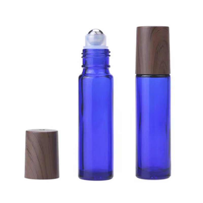 Roll on glass bottle for essential oil customized travel bottle 5ml 10ml 15ml wooden cap