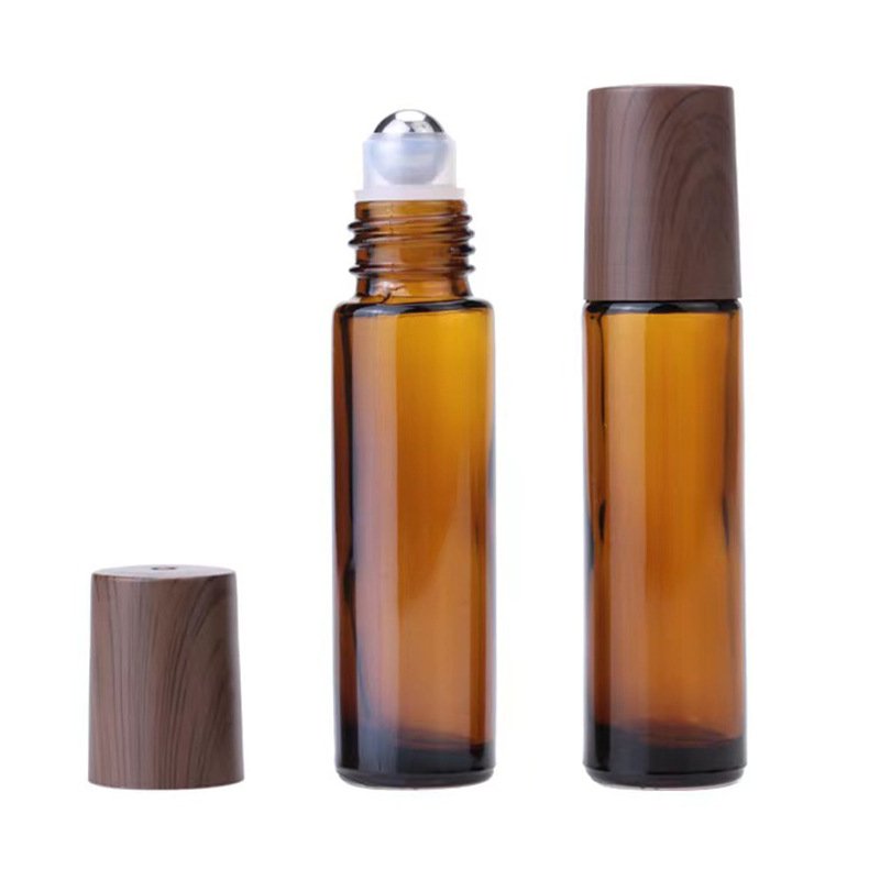 Roll on glass bottle for essential oil customized travel bottle 5ml 10ml 15ml wooden cap
