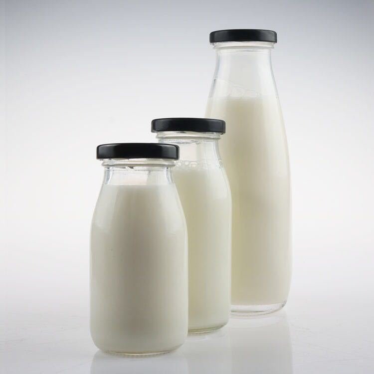 Wholesale sale transparent twist off lids glass milk bottles of various sizes 100ml 200ml 250ml 500ml 1L