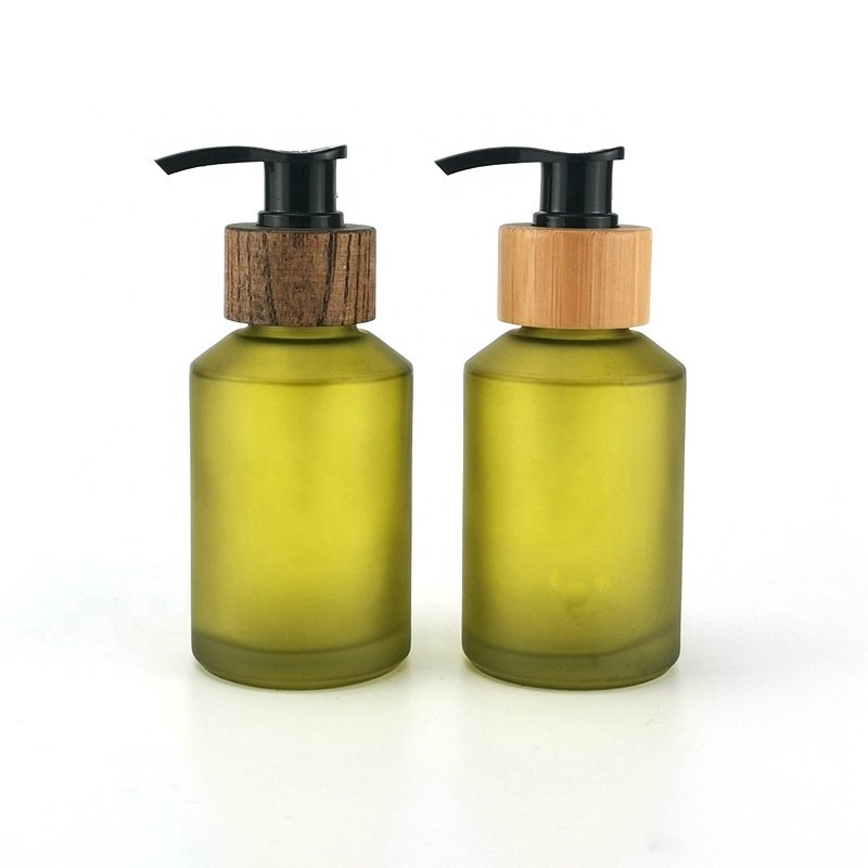 Inclined shoulder glass bottle 125 ml matte black cosmetic bottle 4 oz olive green glass bottle with bamboo pump for cosmetic