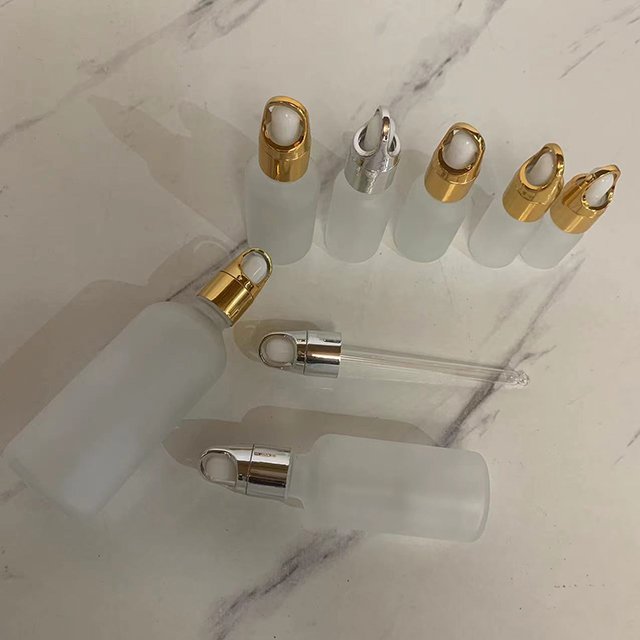 Hengjian ready to ship 5ml 10ml 15ml 20ml 30ml 50ml 100ml frosted glass cosmetic serum bottles for skin care essential oil