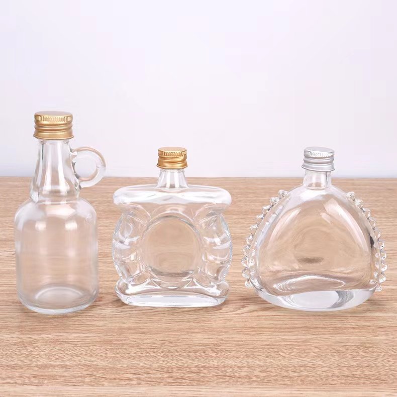 Custom Empty Glass Liquor Bottle 50ml 125ml 500ml 750ml Mini Glass Bottle Vodka Whiskey Alcohol Beverage Bottle with Lid