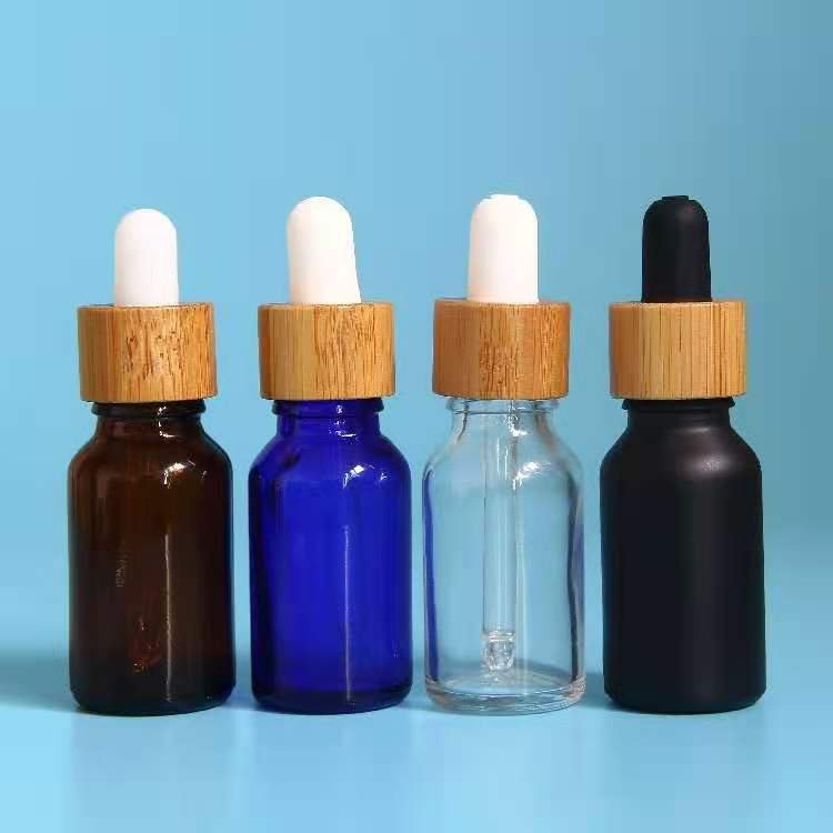 1oz 2oz 5ml 15ml 30ml Frosted Bamboo Dropper Essence Oil Glass Bottle and Easy to Use Body Oil Cosmetic Serum Bottles with Boxes