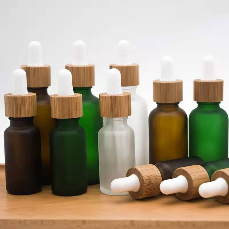 1oz 2oz 5ml 15ml 30ml Frosted Bamboo Dropper Essence Oil Glass Bottle and Easy to Use Body Oil Cosmetic Serum Bottles with Boxes