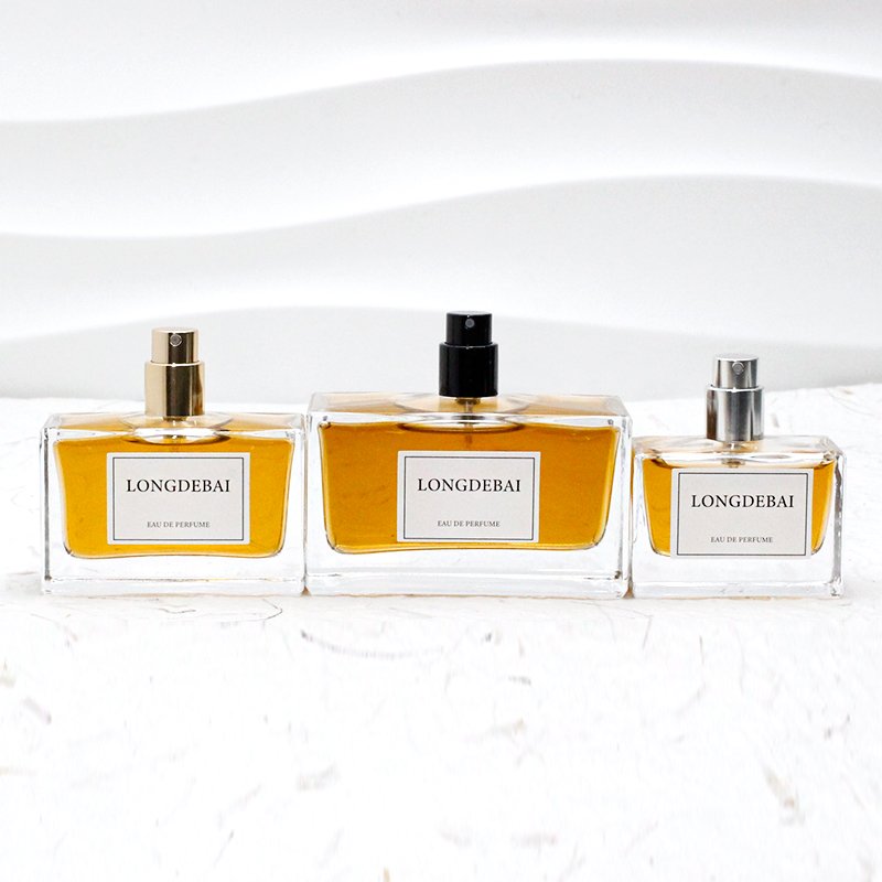 Wholesale empty unisex flat perfume glass bottle 30ml 50ml 100ml crimp perfume bottle with wooden cap