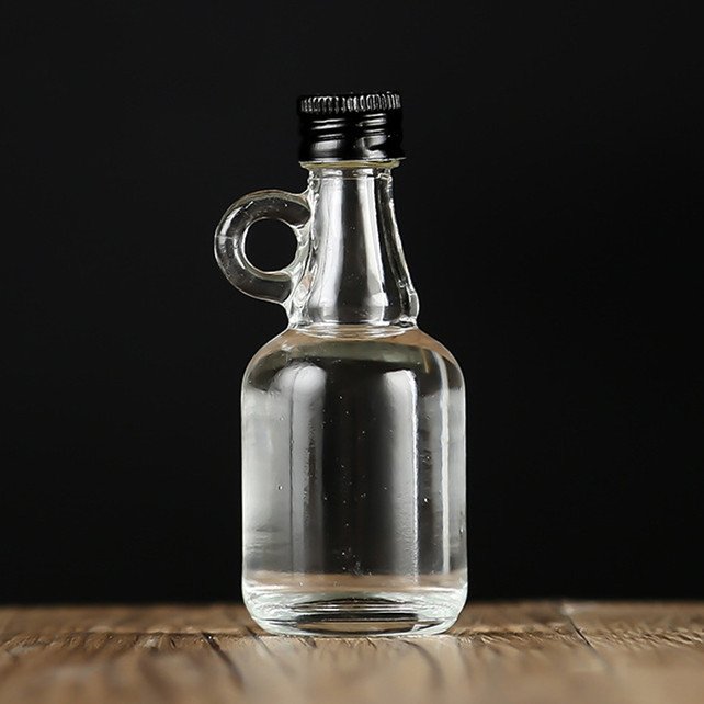 50ml100ml empty clear round liquor small sample glass bottle with metal lid