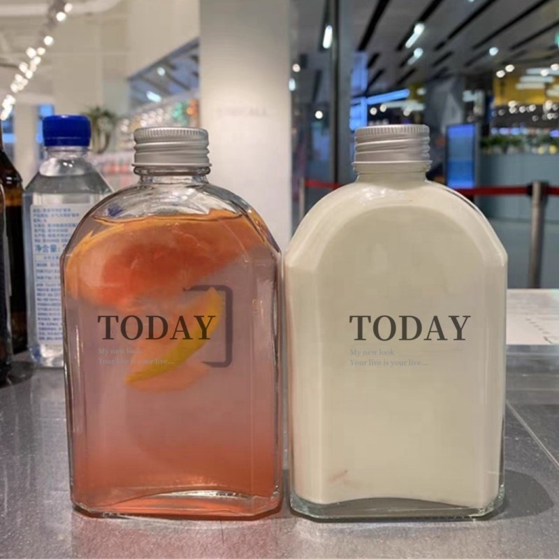 Customized Factory Price Flat Brandy Whisky Gin Tequila Glass Bottle 250ml 500ml Oval Shape Flask Glass Spirits Bottle