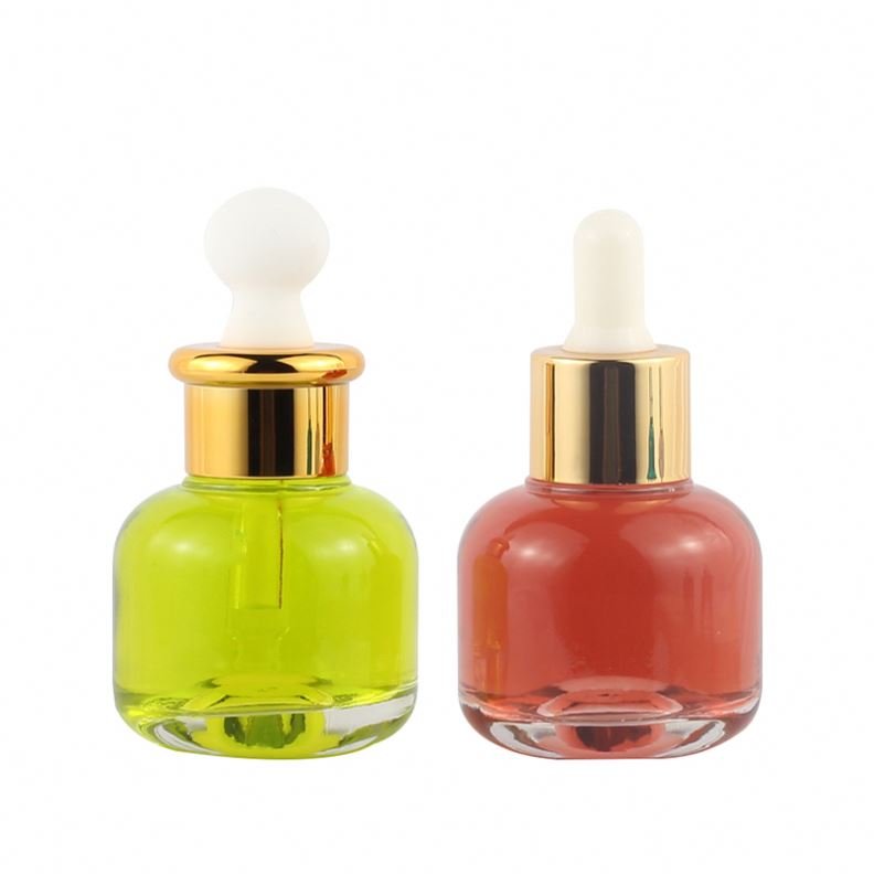 Cheap wholesale cylindrical transparent skin care essence bottle 30ml glass dropper bottle