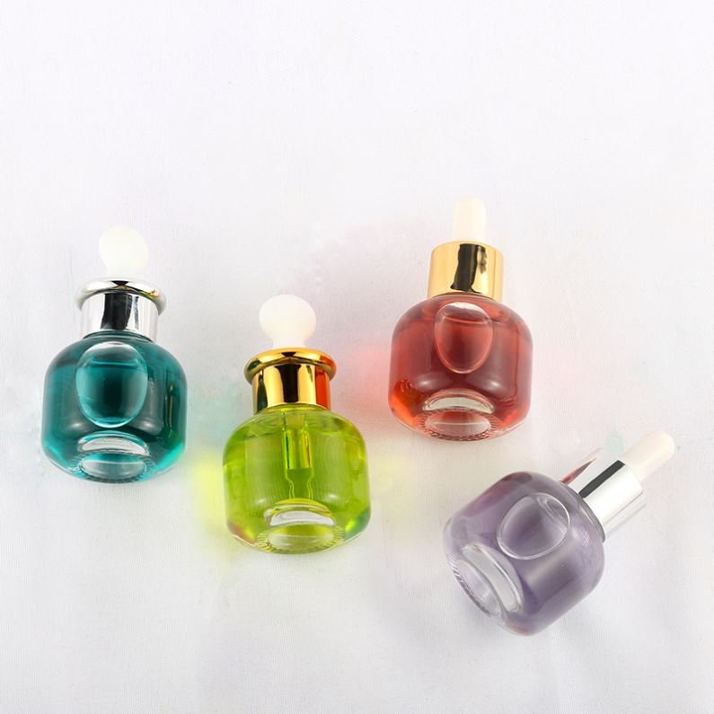 Cheap wholesale cylindrical transparent skin care essence bottle 30ml glass dropper bottle