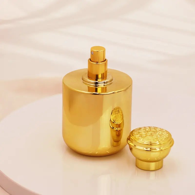 Factory direct wholesale High quality 100ml Luxury Newest Design Golden Luxury Round Glass Perfume Bottle with Screw Cap