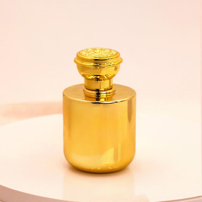 Factory direct wholesale High quality 100ml Luxury Newest Design Golden Luxury Round Glass Perfume Bottle with Screw Cap