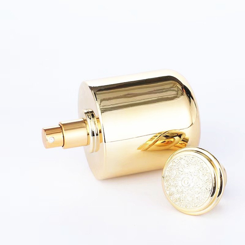 Factory direct wholesale High quality 100ml Luxury Newest Design Golden Luxury Round Glass Perfume Bottle with Screw Cap