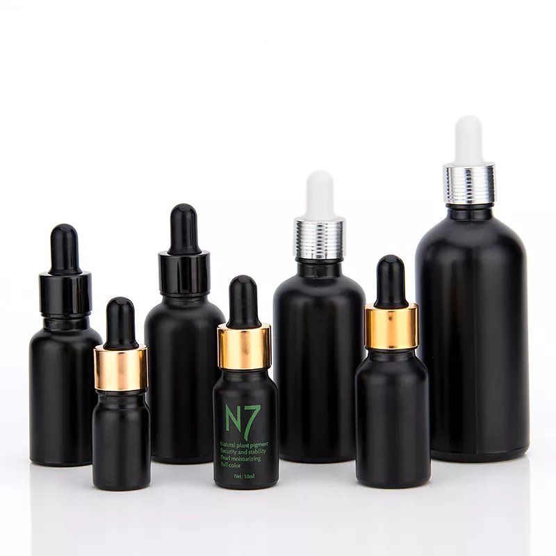 Wholesale 5ml 10ml 15ml 20ml 30ml 50ml 100ml matte black essential oil glass dropper bottles skincare essence hair oil bottle