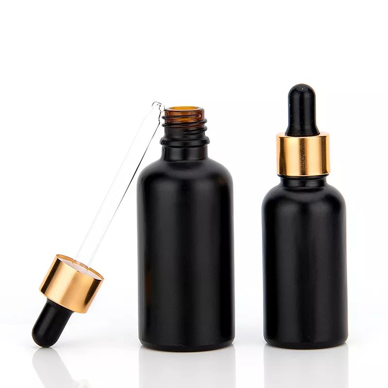 Wholesale 5ml 10ml 15ml 20ml 30ml 50ml 100ml matte black essential oil glass dropper bottles skincare essence hair oil bottle
