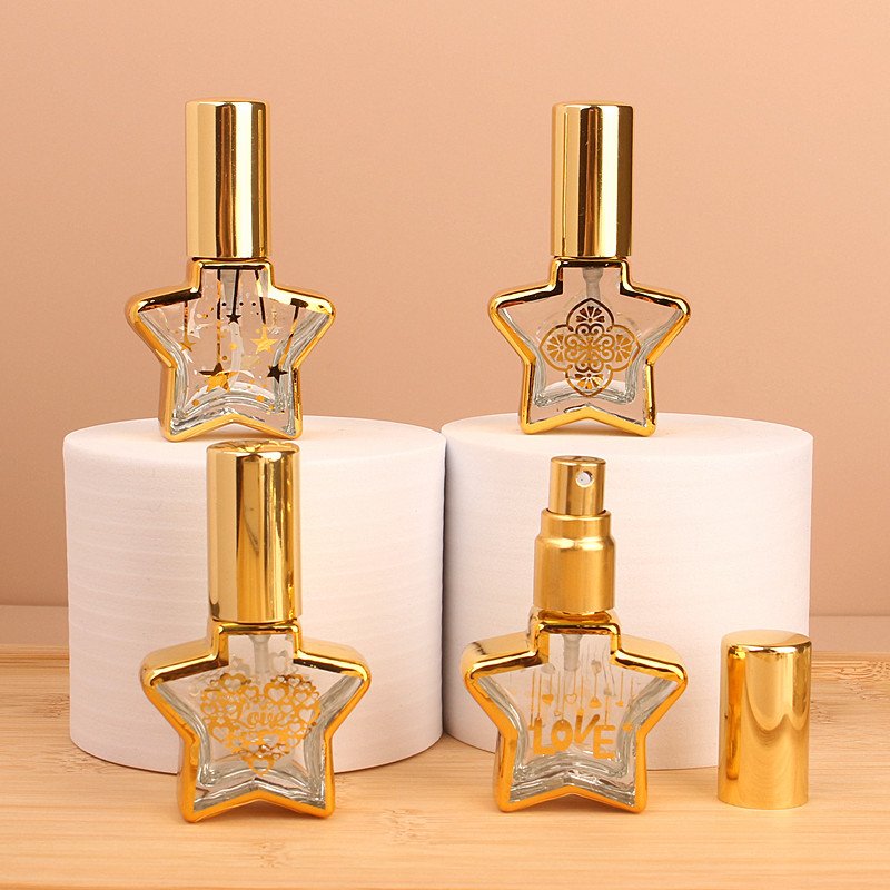 Empty fancy 8ml star shape gold stamping clear glass spray bottle perfume sample bottle with gold spray cap