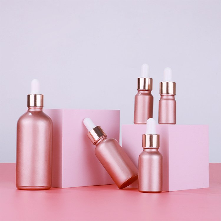 Custom serum dropper bottle 30ml 50ml for matte pink glass bottles with dropper with pink glass cosmetic packaging