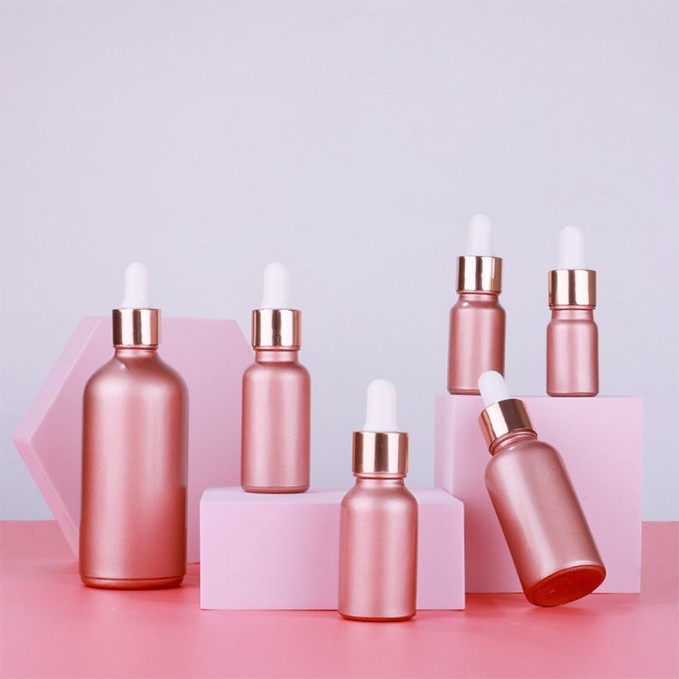Custom serum dropper bottle 30ml 50ml for matte pink glass bottles with dropper with pink glass cosmetic packaging