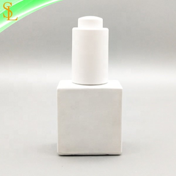 Fancy matte white glass dropper bottle 10ml with matte white press pump dropper cap for eye serum and lash adhesive