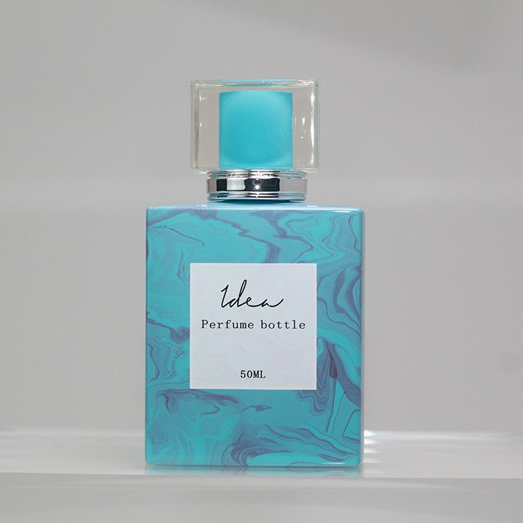 High Quality Custom Wholesale Vacuum Heat Transfer Lake Blue Marbling Spray-head 75ml Perfume Glass Bottle