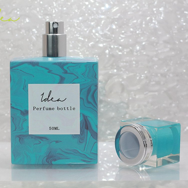 High Quality Custom Wholesale Vacuum Heat Transfer Lake Blue Marbling Spray-head 75ml Perfume Glass Bottle