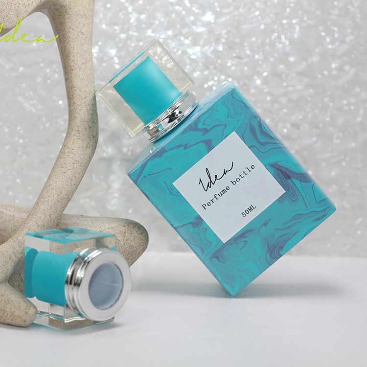 High Quality Custom Wholesale Vacuum Heat Transfer Lake Blue Marbling Spray-head 75ml Perfume Glass Bottle
