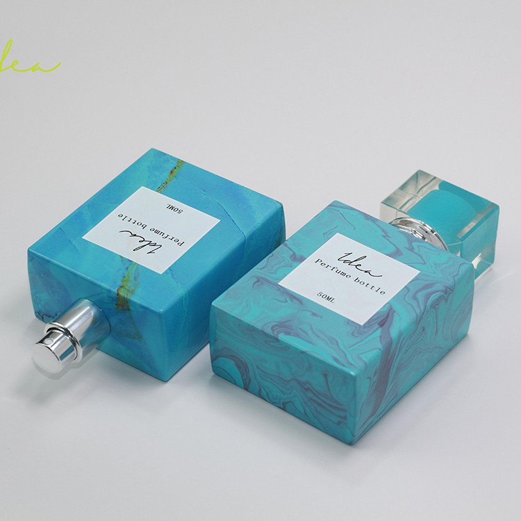 High Quality Custom Wholesale Vacuum Heat Transfer Lake Blue Marbling Spray-head 75ml Perfume Glass Bottle