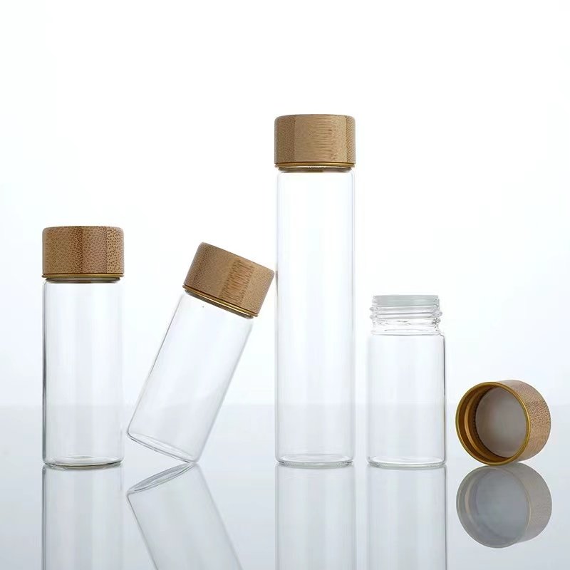 Customize Tall Small Diy Cosmetic Tube Glass Jar Glass Bottle With Bamboo Lids