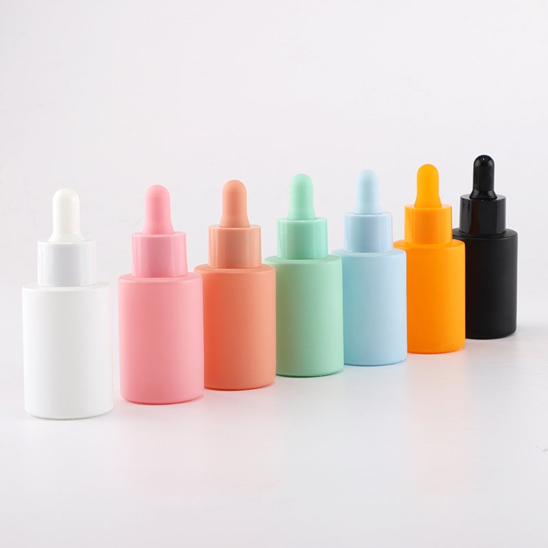 In stock 30ml Flat Shoulder Multi-Colored Cosmetic Glass Oil Bottle Dropper Skincare Packaging Custom Essential Oil Bottle