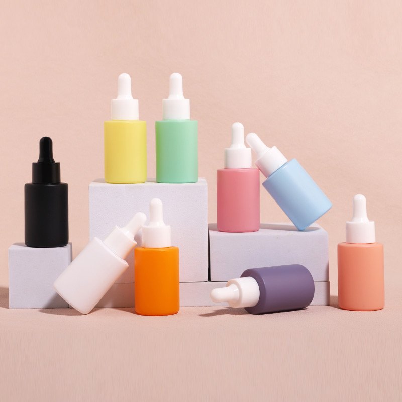In stock 30ml Flat Shoulder Multi-Colored Cosmetic Glass Oil Bottle Dropper Skincare Packaging Custom Essential Oil Bottle